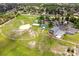 Community aerial view showcasing a park, a baseball field and a pool at 10947 Brickside Ct, Riverview, FL 33579