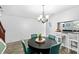 Cozy dining area with a view into the kitchen at 10947 Brickside Ct, Riverview, FL 33579