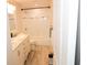 Tastefully updated bathroom with double sinks, new floors, and a tub/shower combo at 1103 E Lambright St, Tampa, FL 33604