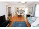 Spacious living area with hardwood floors, open layout, and contemporary decor at 1103 E Lambright St, Tampa, FL 33604