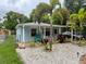 Exterior view of cozy single story home with front patio at 111 12Th Ave, Indian Rocks Beach, FL 33785