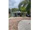 Charming single-story home with brick driveway and tropical landscaping at 111 12Th Ave, Indian Rocks Beach, FL 33785