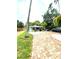 Attractive single-story home with brick driveway and lush landscaping at 111 12Th Ave, Indian Rocks Beach, FL 33785