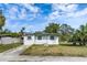 Charming single-story home featuring a well-maintained exterior with a welcoming front yard and classic design at 111 W Keyes Ave, Tampa, FL 33602