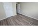 Comfortable bedroom featuring durable laminate floors and closet at 1120 Union S St, St Petersburg, FL 33712