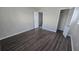 Comfortable bedroom featuring durable laminate floors and closet at 1120 Union S St, St Petersburg, FL 33712