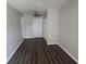 Bonus room featuring laminate floors, fresh paint and ceiling fan at 1120 Union S St, St Petersburg, FL 33712