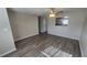 Bright living room featuring laminate flooring, fresh paint and ceiling fan at 1120 Union S St, St Petersburg, FL 33712