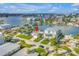 Beautiful waterfront property featuring a private dock and green surroundings, providing scenic water views at 11240 6Th E St, Treasure Island, FL 33706