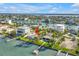 Charming waterfront home with private dock, and verdant landscaping, offering beautiful scenic water views at 11240 6Th E St, Treasure Island, FL 33706