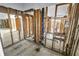Basement featuring open floor plan and exposed plumbing awaiting renovation at 11240 6Th E St, Treasure Island, FL 33706
