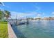 Private dock with boat lift offering direct access to the waterway at 11240 6Th E St, Treasure Island, FL 33706