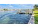 Private dock with boat lift offering direct access to the waterway at 11240 6Th E St, Treasure Island, FL 33706