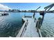 Close up of dock, seawall and boat lift at 11240 6Th E St, Treasure Island, FL 33706