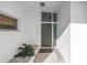 Front door of property with garden features at 11240 6Th E St, Treasure Island, FL 33706
