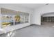 Bright living room with views of the waterfront and featuring large windows at 11240 6Th E St, Treasure Island, FL 33706