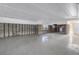 Bright living room with cinder block walls and large windows offering lots of natural light at 11240 6Th E St, Treasure Island, FL 33706