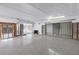 Spacious living room featuring decorative ceilings, a fireplace, and sliding glass doors at 11240 6Th E St, Treasure Island, FL 33706