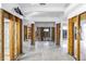 Renovation opportunity to transform this spacious, light-filled living space with terrazzo floors at 11240 6Th E St, Treasure Island, FL 33706