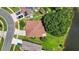 Home featuring mature trees surrounding the property, with beautiful landscaping at 11550 Wellman Dr, Riverview, FL 33578