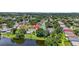Beautiful aerial view of the property featuring waterfront access and lush, mature trees at 11550 Wellman Dr, Riverview, FL 33578