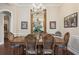 Elegant dining room with a chandelier and seating for eight at 11610 Grove Arcade Dr, Riverview, FL 33569