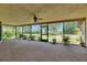 Patio with screens, plants, and carpeted flooring at 1309 Sandalwood Dr, Plant City, FL 33563