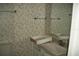 Bathroom featuring a vanity sink, wallpaper, and coordinating mirror at 13627 San Rafael Dr, Largo, FL 33774