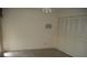 A bedroom with a standard closet and minimal decor at 13627 San Rafael Dr, Largo, FL 33774