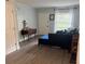 Inviting living room with hardwood floors and a comfortable blue sofa at 14219 Shadow Moss Ln # 102, Tampa, FL 33613