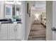 Well-lit bathroom with granite countertops, double sinks, and an attractive decor at 1561 S Martin Luther King Jr Ave, Clearwater, FL 33756