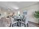 Cozy dining area with a stylish table set and views of the living room at 1561 S Martin Luther King Jr Ave, Clearwater, FL 33756