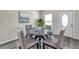 Cozy dining area featuring a modern table and chairs with natural light at 1561 S Martin Luther King Jr Ave, Clearwater, FL 33756