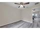Bright dining room features wood-look floors and a modern ceiling fan with views to the home's interior at 1561 S Martin Luther King Jr Ave, Clearwater, FL 33756