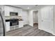 Modern kitchen with stainless steel appliances and white cabinets at 1561 S Martin Luther King Jr Ave, Clearwater, FL 33756