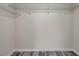 Spacious walk-in closet featuring wire shelving and modern flooring at 1561 S Martin Luther King Jr Ave, Clearwater, FL 33756