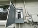 Open electrical box at 1619 E Nome St, Tampa, FL 33604