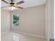 Bedroom featuring a ceiling fan and a window offering natural light at 163 Swift St, Port Charlotte, FL 33954