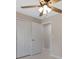 Bedroom with double closets, ceiling fan, and neutral paint at 163 Swift St, Port Charlotte, FL 33954