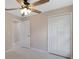Bedroom featuring large closet, ceiling fan, and neutral color walls at 163 Swift St, Port Charlotte, FL 33954