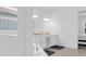 Bright white bathroom featuring double sinks and soaking tub at 17415 Holly Well Ave, Wimauma, FL 33598
