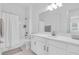 Clean and bright bathroom features a shower-tub combo and single vanity at 17415 Holly Well Ave, Wimauma, FL 33598