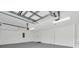 Spacious two-car garage with plenty of room for storage at 17415 Holly Well Ave, Wimauma, FL 33598