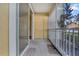 Screened balcony with sliding glass doors and storage closet at 18001 Richmond Place Dr # 116, Tampa, FL 33647