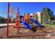 Colorful playground with slides and climbing structures for children at 18001 Richmond Place Dr # 116, Tampa, FL 33647