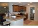 Kitchen with ample cabinet space, and a breakfast bar with bar stool seating at 3212 Stevenson St, Plant City, FL 33566