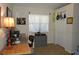 Bright office space with desk, filing cabinet, and natural light from a window at 3212 Stevenson St, Plant City, FL 33566