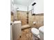 Cozy bathroom featuring tiled shower with built in caddy and a single sink vanity at 3315 58Th S Ave # 115, St Petersburg, FL 33712