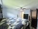 Comfortable bedroom featuring modern furniture, hardwood floors, and natural light at 3315 58Th S Ave # 115, St Petersburg, FL 33712