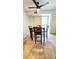Cozy dining area with table and chairs adjacent to sliding door and closet at 3315 58Th S Ave # 115, St Petersburg, FL 33712